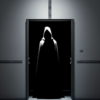 hooded shadowy figure in dark doorway