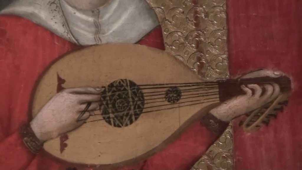 strumming a lute, medieval painting